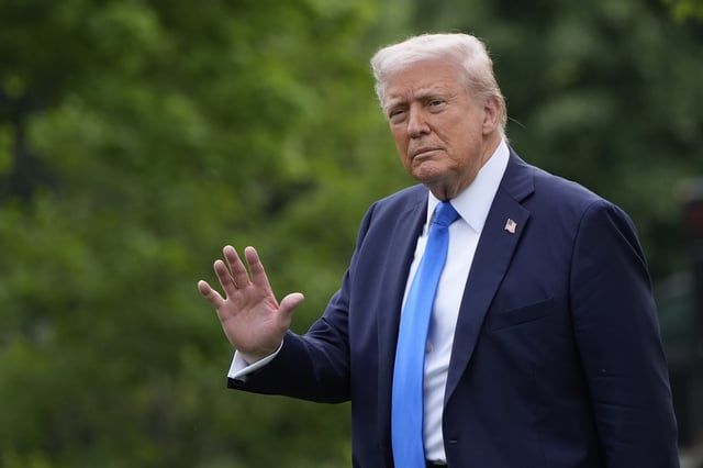 President Donald Trump waves as he walks from the Oval Office to depart on Marine One from the South Lawn of the White House, Thursday, May 1, 2025, in Washington.
