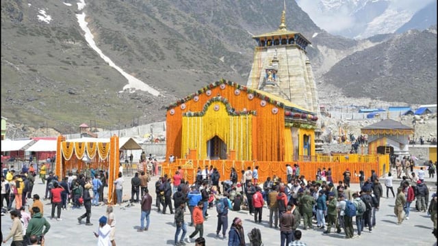 People gather at Kedarnath Dham after the portals were opened to devotees on Friday. (HT Photo)