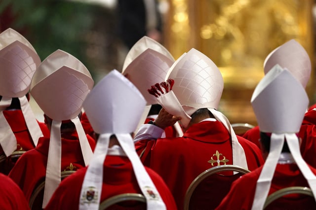 Cardinals attend a mourning Mass for Pope Francis on the sixth day of Novendiali (nine days of mourning after the Pope's funeral) at St. Peter's Basilica at the Vatican, May 1, 2025. REUTERS/Amanda Perobelli/File Photo