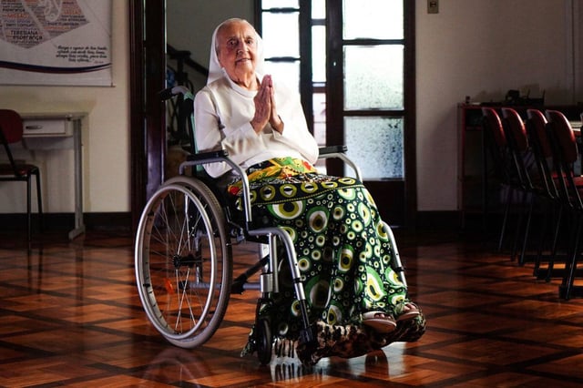 Sister Inah Canabarro Lucas puts her hands together in prayer as pictured in February 2024.