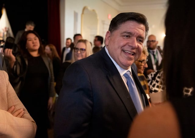 Gov. JB Pritzker greets people during a 60th anniversary celebration of the Illinois Arts Council on April 29, 2025, at the Illinois Governor’s Mansion in Springfield. Pritzker appeared as a guest on the Jimmy Kimmel Live show Thursday evening. (Brian Cassella/Chicago Tribune)