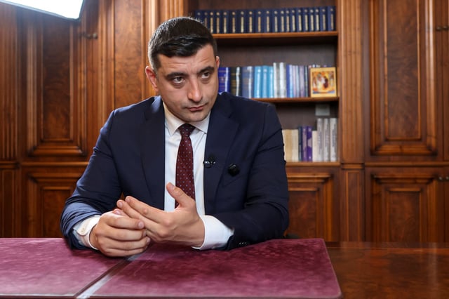 Far-right opposition leader and presidential candidate George Simion looks on as he answers questions during an interview with Reuters, in Bucharest, Romania, May 2, 2025. Inquam Photos/George Calin via REUTERS