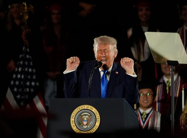 President Donald Trump delivers a special commencement address to University of Alabama graduates at Coleman Coliseum. Graduation occurs over the weekend. Trump tells a story about a female weight lifter struggling in a competition with a trans weight lifter.