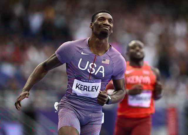 Paris 2024 Olympics - Athletics - Men's 100m Semi-Final 3 - Stade de France, Saint-Denis, France - August 04, 2024. Fred Kerley of United States reacts after finishing semi-final 3 in second place REUTERS/Dylan Martinez/ File Photo