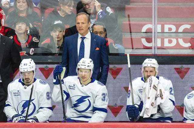 Apr 3, 2025; Ottawa, Ontario, CAN; Tampa Bay Lightning Head coach Jon Cooper follows the action in the third period against the  Ottawa Senators at the Canadian Tire Centre. Mandatory Credit: Marc DesRosiers-Imagn Images/File Photo