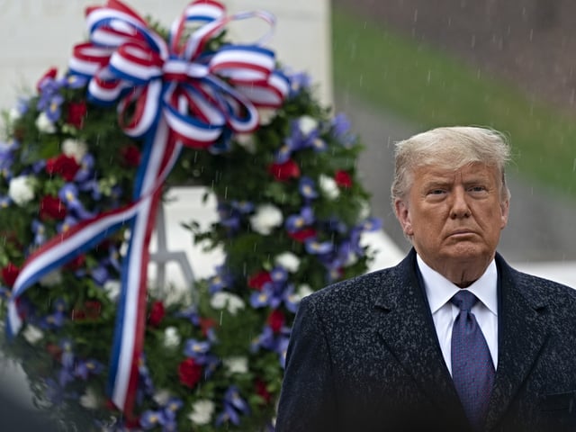 U.S. President Donald Trump participates in a National Veterans Days ceremony in Arlington, Virginia, U.S., on Wednesday, Nov. 11, 2020. President-elect Joe Biden shrugged off Trump's effort to challenge the election results, forging ahead with transition planning even as the president pursues a multistate legal fight backed by Republican allies and the Justice Department. Photographer: Chris Kleponis/CNP/Bloomberg