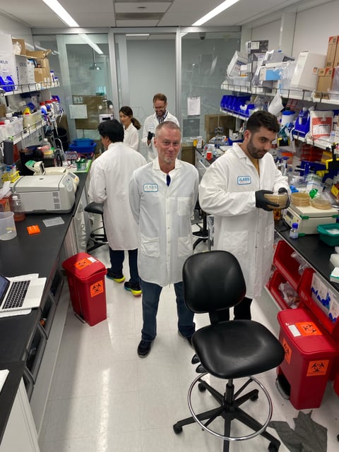 Tim Friede, center, with colleagues Mark Bellin, right, Joel Andrade, left, Gengan Li, back left, and Nicholas Bayless, back center.