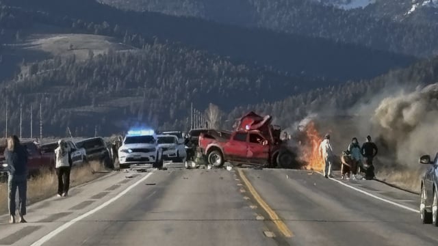 Rescue workers arrive to the scene after a deadly collision between a pickup truck and tour van near Henry’s Lake State Park in eastern Idaho on Thursday, May 1, 2025. (Roger Merrill via A)