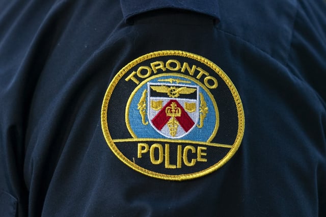 A Toronto Police Service logo patch is shown in Toronto, on Tuesday, Sept. 5, 2023. Toronto police say they've rescued one person after a plane landed in the water in the city's east end. THE CANADIAN PRESS/Spencer Colby