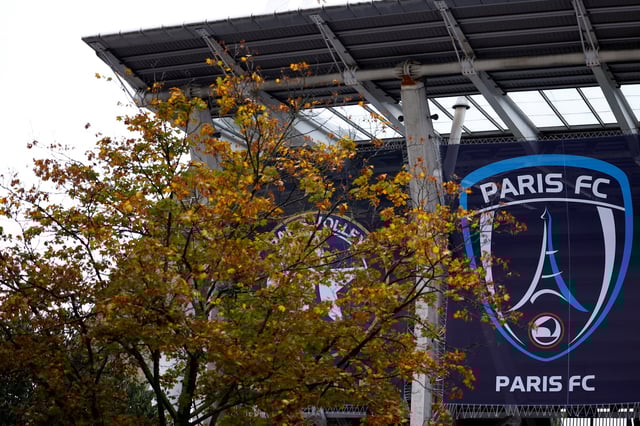 A logo of the soccer club Paris FC is seen at the entrance of the Stade Charlety in Paris, France, October 18, 2024. REUTERS/Sarah Meyssonnier/File Photo