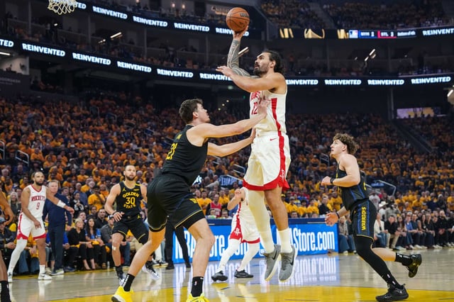 Houston Rockets center Steven Adams (12) shoots over Golden State Warriors center Quinten Post (21) during the first half in Game 6 of a first-round NBA playoff basketball series at Chase Center in San Francisco, Thursday, May 1, 2025.