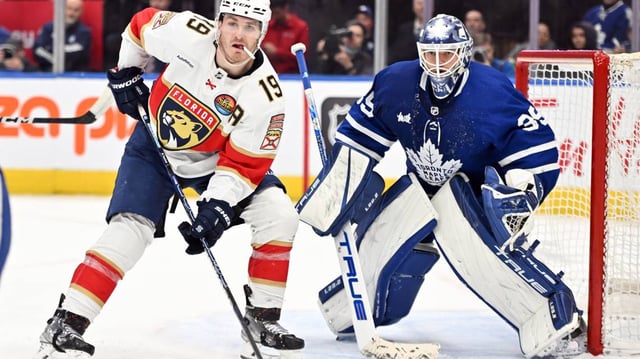 Florida Panthers forward Matthew Tkachuk (19) takes up a position in front of Toronto Maple Leafs goalie Ilya Samsonov (35).