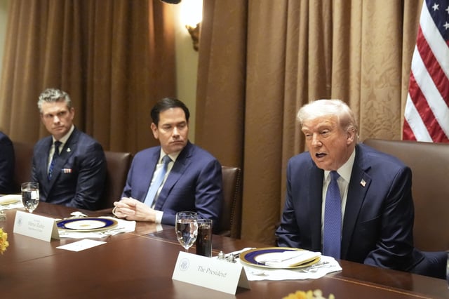 FILE - President Donald Trump, from right, speaks as as Secretary of State Marco Rubio and Secretary of Defense Pete Hegseth listen during a bilateral luncheon in the Cabinet Room of the White House, April 24, 2025, in Washington. (AP Photo/Mark Schiefelbein, File)