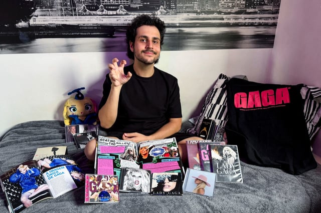 A Brazilian fan of Lady Gaga, Matheus Silvestroni, displays his Lady Gaga memorabilia and discs at his home in Sao Paulo, Brazil April 24, 2025. REUTERS/Lais Morais