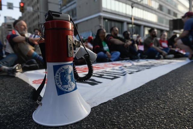 Demonstrators rally in Philadelphia on May 1, 2025 as part of a May Day rally on May 1, 2025.