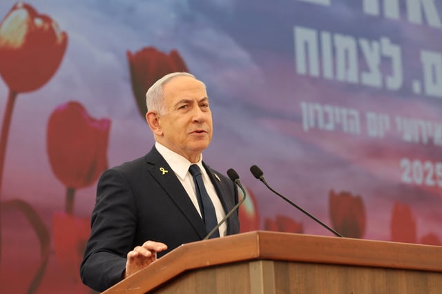 Israeli Prime Minister Benjamin Netanyahu speaks during the annual ceremony at the eve of Israel’s Remembrance Day for fallen soldiers (Yom HaZikaron) at the Yad LaBanim Memorial in Jerusalem, 29 April 2025 . ABIR SULTAN POOL/Pool via REUTERS/File Photo