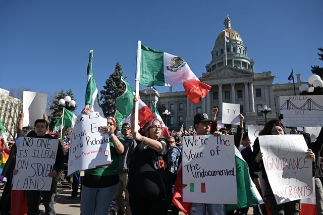 Protesters gather outside the Colorado Capitol building on the same day that federal authorities conducted immigration raids in metro Denver on Wednesday, Feb. 5, 2025. (Photo by Hyoung Chang/The Denver Post)
