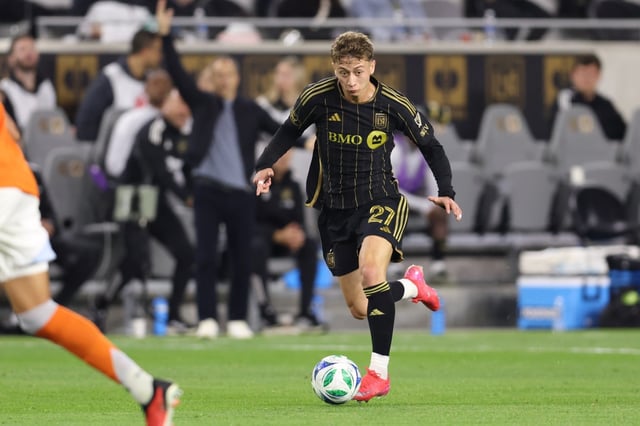 LAFC forward Nathan Ordaz (27) moves the ball up the field against the Houston Dynamo FC during the first half of an MLS match at BMO Stadium in Los Angeles, on Saturday, May 3, 2025.  (Photo by Raul Romero Jr., Contributing Photographer)