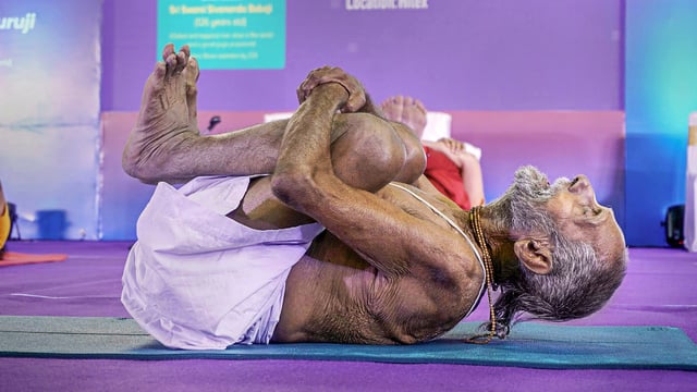 Yoga Guru Swami Sivananda performs an 'asana' during the Hitex SportsExpo, in Hyderabad. Swami Sivananda passed away due to cardiac arrest late Saturday.
