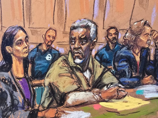 Sean "Diddy" Combs sits with members of his defense team Teny Geragos and Alexandra Shapiro for a conference ahead of his trial on April 18.