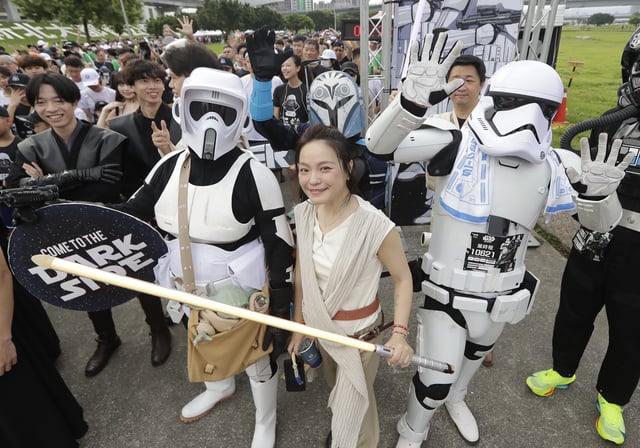 People dressed as characters of the movie ''Star Wars'' participate in the Star Wars Run event in New Taipei City, Taiwan, Sunday, May 4, 2025. 