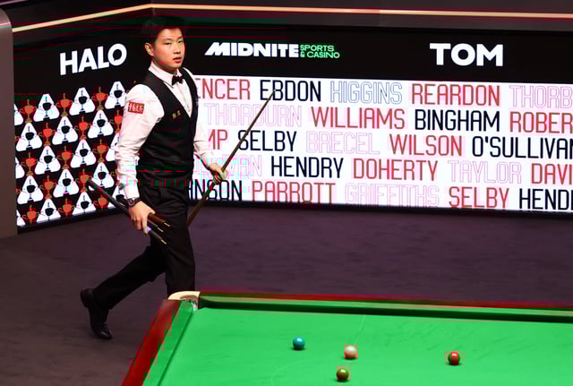 Snooker - World Snooker Championship - The Crucible Theatre, Sheffield, Britain - May 4, 2025 China's Xintong Zhao during his final match against Wales' Mark Williams Action Images via Reuters/Andrew Boyers