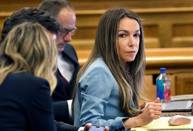 Karen Read sits at the defense table during her murder trial in Norfolk Superior Court in Dedham, Mass., Wednesday, April 30, 2025. (Greg Derr/The Patriot Ledger via AP, Pool)
