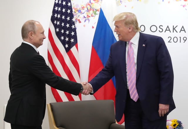 Russia's President Vladimir Putin shakes hands with U.S. President Donald Trump during a meeting on the sidelines of the G20 summit in Osaka, Japan June 28, 2019. Sputnik/Mikhail Klimentyev/Kremlin via REUTERS