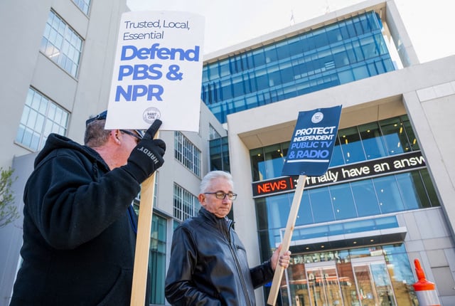 People participate in a rally to call on Congress to protect funding for U.S.  public broadcasters PBS and NPR in Washington, D.C., on March 26, 2025.