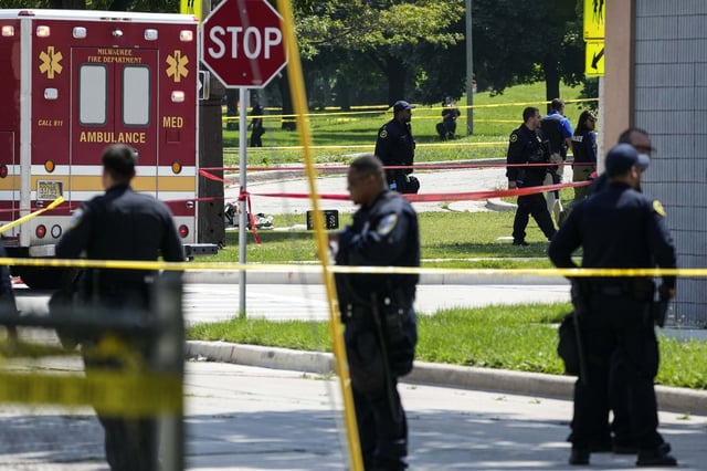 FILE - Police investigate a shooting near King Park during the second day of the 2024 Republican National Convention, July 16, 2024, in Milwaukee. (AP Photo/Alex Brandon, file)