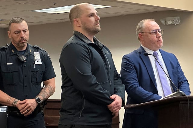 Correctional officer Christopher Walrath, center, appears in Oneida County Court, Monday, May 5, 2025, in Utica, N.Y., to enter a guilty plea for manslaughter in the December 2024 death of inmate Robert Brooks. (AP Photo/Michael Hill)