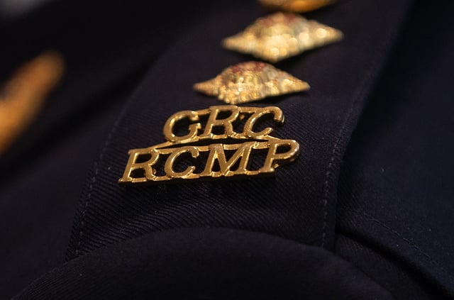An RCMP epaulette is seen in Edmonton, Wednesday, Feb. 5, 2025. RCMP say four people, including two teens, have died after a head-on collision south of Edmonton. THE CANADIAN PRESS/Jason Franson