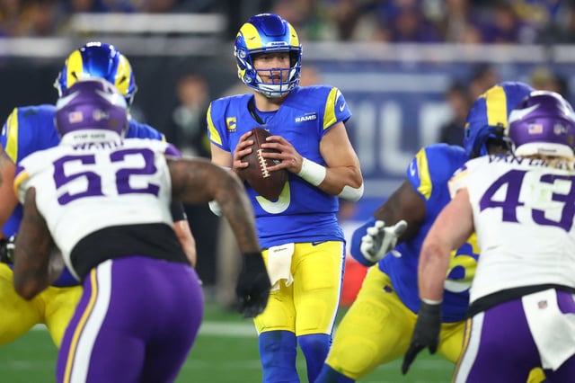Jan 13, 2025; Glendale, AZ, USA; Los Angeles Rams quarterback Matthew Stafford (9) drops back to pass against the Minnesota Vikings during the second half in an NFC wild card game at State Farm Stadium. Mandatory Credit: Mark J. Rebilas-Imagn Images/File Photo