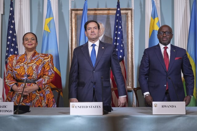 FILE - Secretary of State Marco Rubio hosts a signing ceremony in which Congo's Foreign Minister Therese Kayikwamba Wagner, left, and Rwanda's Foreign Minister Olivier Nduhungirehe, right, pledge to work toward a peace deal on Friday, April 25, 2025, at the State Department in Washington. (AP Photo/Jacquelyn Martin, File)