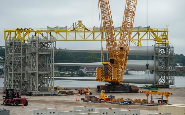 Wind turbine blades are being prepped at the State Pier in New London on Wednesday, July 10, 2024 for the Revolution Wind’s wind turbines. (Aaron Flaum/Hartford Courant)