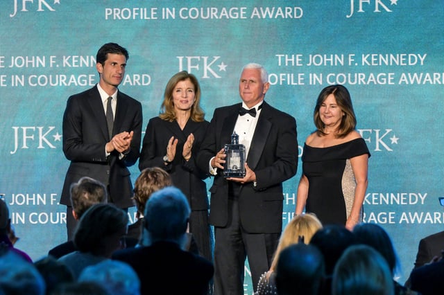 Caroline Kennedy Schlossberg and her son Jack Schlossberg present the 2025 John F. Kennedy Profile in Courage Award to former U.S. Vice President Mike Pence at the John F. Kennedy Presidential Library and Museum in Boston. May 4, 2025.