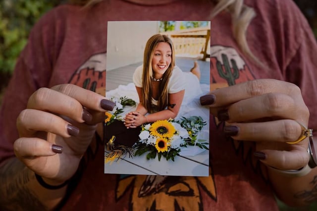 Candace Fails poses for a portrait holding a picture of her late daughter, Nevaeh Crain, at her home in Vidor, Texas on October 24, 2024. Crain passed away on October 29, 2023 at 25 weeks of pregnancy due to preventable causes, including hemorrhaging, after seeking medical help at various hospitals. (Courtesy: Danielle Villasana/ProPublica)