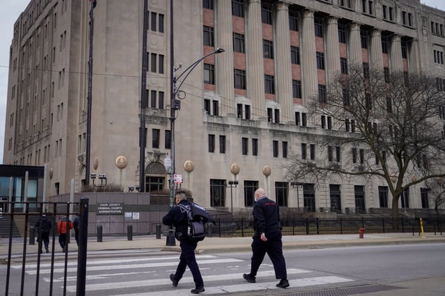 People walk into the George N. Leighton Criminal Court Building in Little Village on Feb. 1, 2025. (Audrey Richardson/Chicago Tribune)