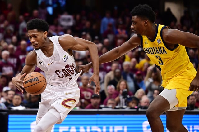 May 4, 2025; Cleveland, Ohio, USA; Cleveland Cavaliers forward De'Andre Hunter (12) drives to the basket against Indiana Pacers center Thomas Bryant (3) during the second half in game one of the second round for the 2025 NBA Playoffs at Rocket Arena. Mandatory Credit: Ken Blaze-Imagn Images/File Photo