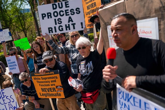 Protesters chant during a demonstration against President Donald Trump’s use of El Salvador’s Terrorism Confinement Center, or CECOT, prison for people deported from the U.S. The protest was outside the Embassy of El Salvador in Washington, D.C., on  April 14, 2025. (AP Photo/Nathan Howard)