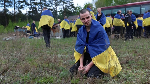 Ukrainian prisoners of war (POWs) are seen after a swap, amid Russia's attack on Ukraine, at an unknown location in Ukraine, in this handout picture released May 6, 2025. Ukraine's President Volodymyr Zelenskiy Via Telegram/via REUTERS