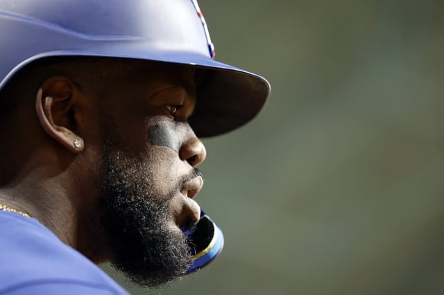HOUSTON, TEXAS - OCTOBER 22: Adolis Garcia #53 of the Texas Rangers looks on against the Houston Astros during the fourth inning in Game Six of the American League Championship Series at Minute Maid Park on October 22, 2023 in Houston, Texas. (Photo by Carmen Mandato/Getty Images)
