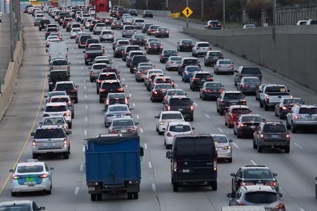 Masses of vehicles move slowly on the Montrose Ave overpass at the 1-90 Kennedy Expressway and the I-94 Edens Split the day before Thanksgiving on November 22, 2017 in Chicago, Illinois.  (Photo by Patrick Gorski/NurPhoto via Getty Images)