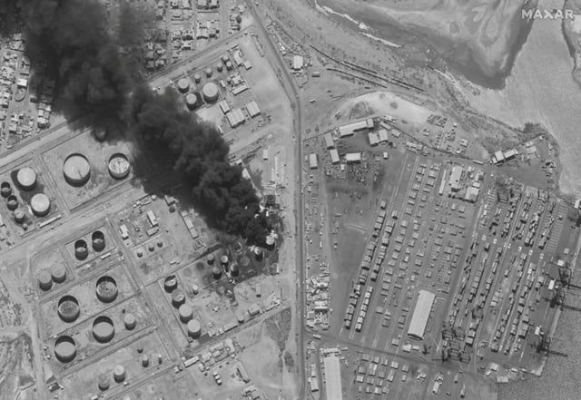 A satellite image shows smoke rising from burning oil tanks in Port Sudan, Sudan May 6, 2025. Maxar Technologies/Handout via REUTERS