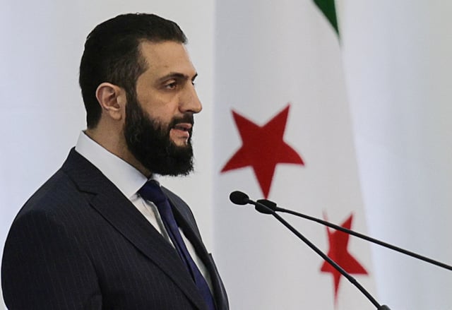 Syria's interim President Ahmed al-Sharaa speaks during a Ministerial formation of the government of the Syrian Arab Republic, in Damascus, Syria March 29, 2025. REUTERS/Khalil Ashawi/File Photo