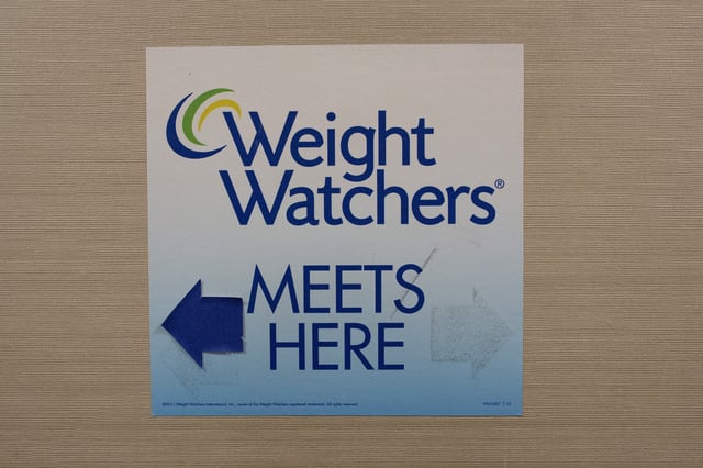 A sign for Weight Watchers is displayed at office in lower Manhattan, New York October 19, 2015.