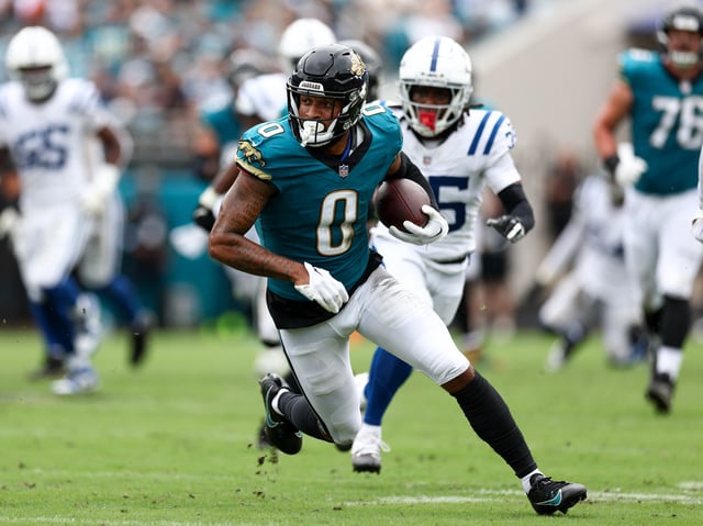 Oct 6, 2024; Jacksonville, Florida, USA; Jacksonville Jaguars wide receiver Gabe Davis (0) runs with the ball against the Indianapolis Colts in the second quarter at EverBank Stadium. Nathan Ray Seebeck-Imagn Images/ File Photo
