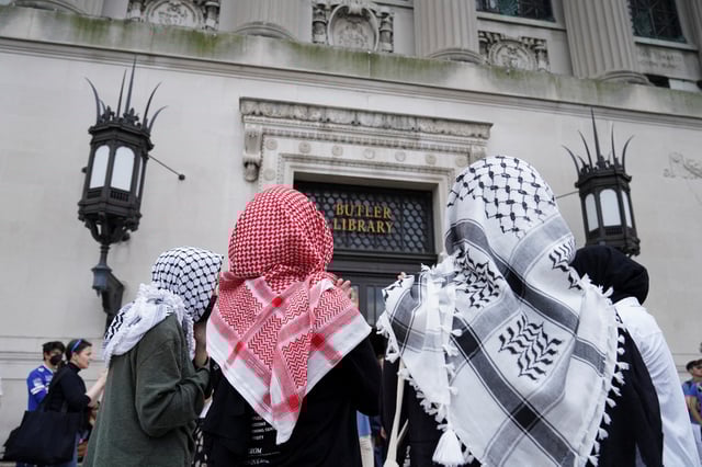 People take part in a pro-Palestinian protest at Butler Library on the campus of Columbia University in New York, U.S., May 7, 2025.   REUTERS/Ryan Murphy