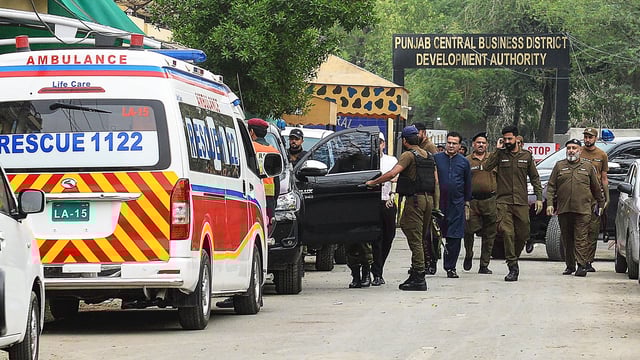 Security personnel cordon off a street near a site after an alleged drone was shot down in Lahore on May 8, 2025.