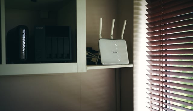 Stock Image: Home office wireless router for broadband online internet connection.